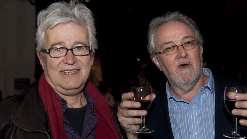 Pierre Nepveu and MC Guy Marchamps raise a glass to poetry. 